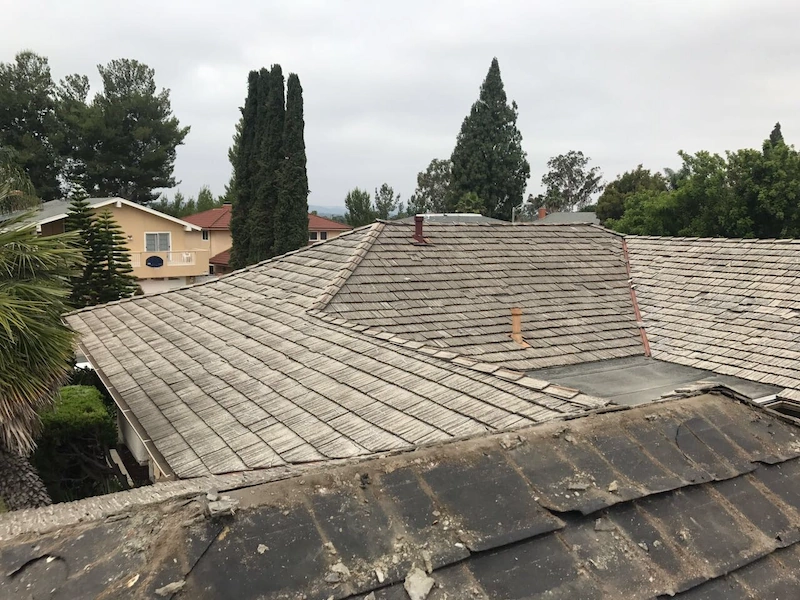 Ted W's damaged and asbestos laden roof damaged and asbestos laden roof that hexagon construction rplaced